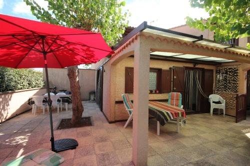 Belle villa de Vacances en angle climatisée, domaine TAMARIS, 4 chambres 7-9 couchages, Wifi, accès aux piscines payant, 900m de la mer LRTAMQ10 Portiragnes france