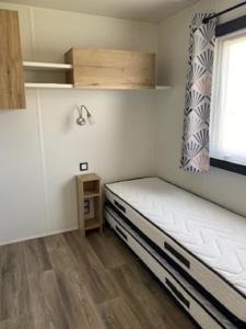 Assist' Mobil Home 389 - Mobil home récent 3 chambres 8 couchages