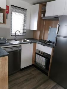 Assist' Mobil Home h01 - Mobil home récent 3 chambres 8 personnes