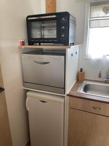 Mobil-home 4/6 Personnes , terrasse couverte ,piscine chauffée .