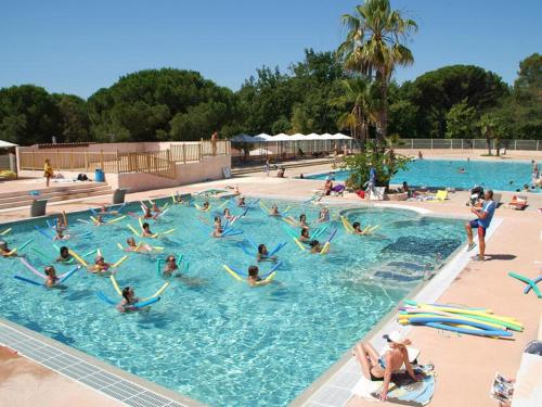 Mobil-home dans Camping L'Oasis 5 étoiles à Puget-sur-Argens