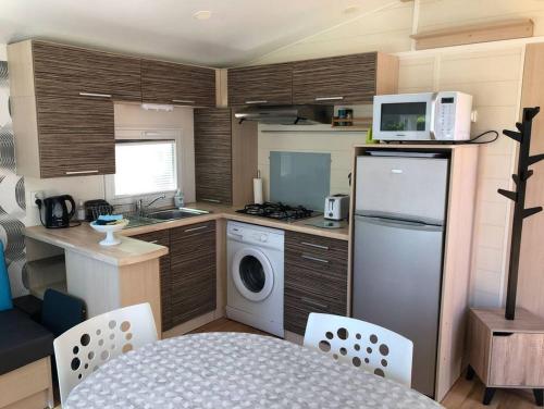 Mobilhome 4/6 personnes proche La Palmyre, Royan