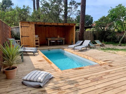 Villa Cap Ferret villa bois avec piscine dans le village de Piquey ref 5 route du truc vert, 114 Lège-Cap-Ferret