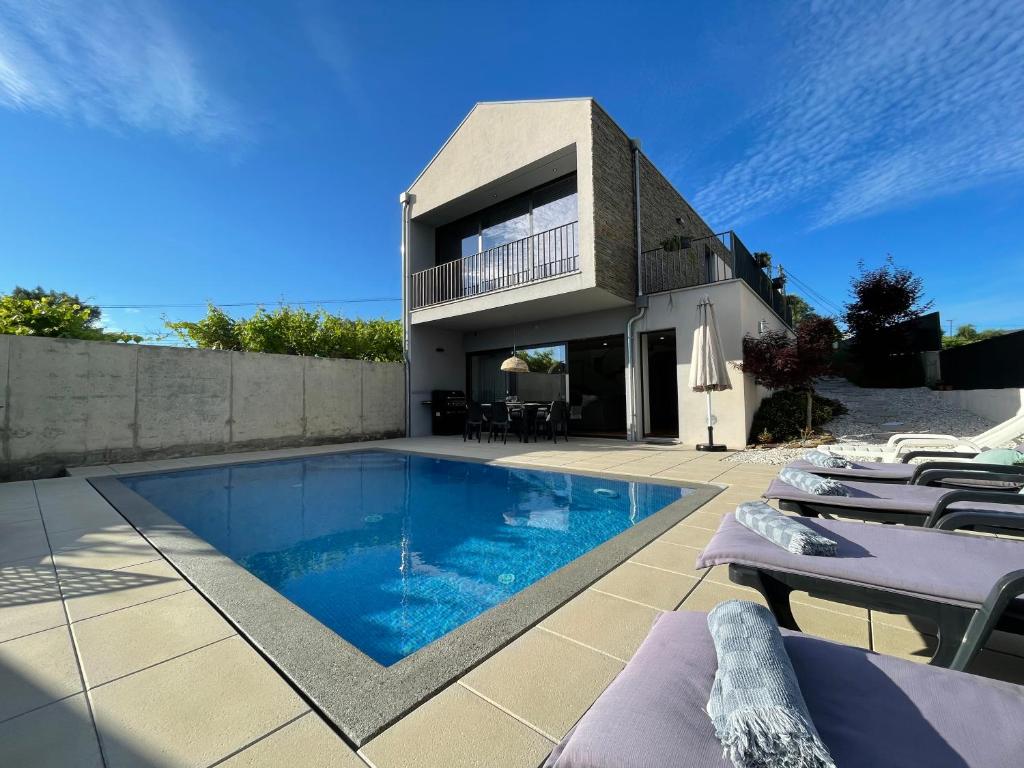 Maison de vacances Casa das Branquinhas - Férias no Minho com piscina! RUA DAS LAMELAS 99, CORRELHÃ, 4990-306 Ponte de Lima