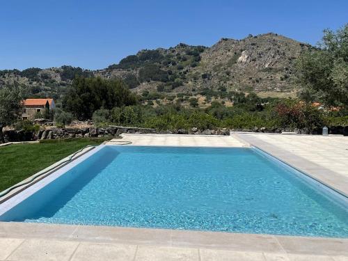 Maisons de vacances Casas da Villa - Monsanto - Oliveira e Videira Rua da Fonte, Valado, Monsanto Relva