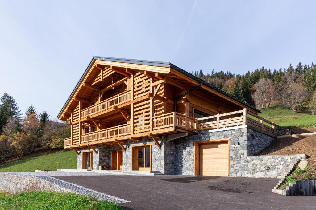 Chalet Chalet La Manigodine Piscine 18-24 pers Contact O6614O9II9 Ancien chemin de la Pusaz, Villard-Dessous 74230 Manigod