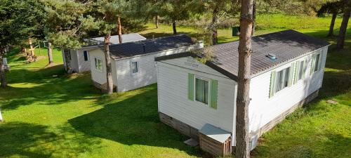 chalet et cabane dans la montagne au Camping les Sapins Camurac france