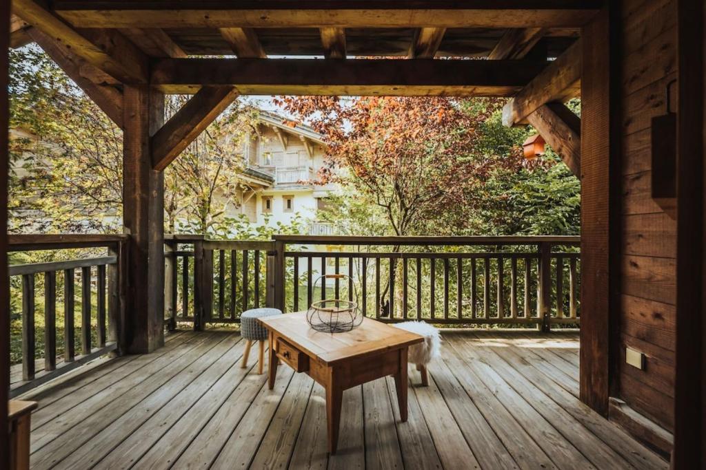 Furnished cozy chalet with a wooded garden and a large terrace 361 Route du Petit Bois, 74120 Demi-Quartier