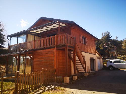 Jolichalet66210-88m2-3ch-garage-jardin-double véranda-wifi-impasse au calme
