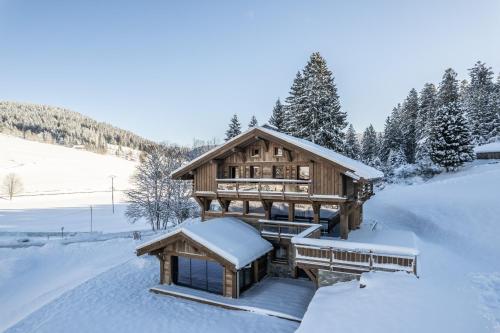 Le Grand V, chalet de luxe avec piscine intérieure