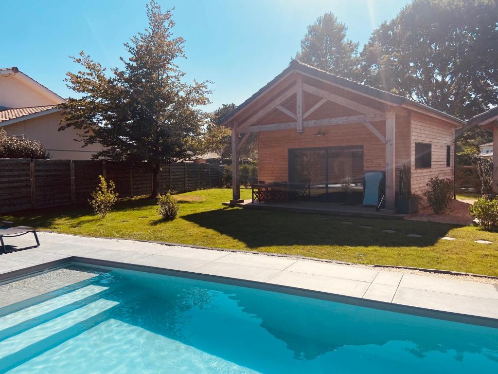Chalet CHALET MONTANA - AU COTTAGE DU MEDOC - Proche de BORDEAUX 3 Chemin du Monastère, 33160 Saint-Aubin-de-Médoc