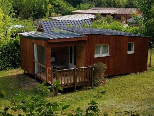 Pleasant chalet in the Dordogne with shared swimming pool