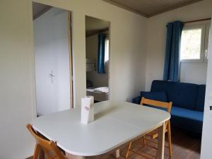 Pleasant chalet in the Dordogne with shared swimming pool