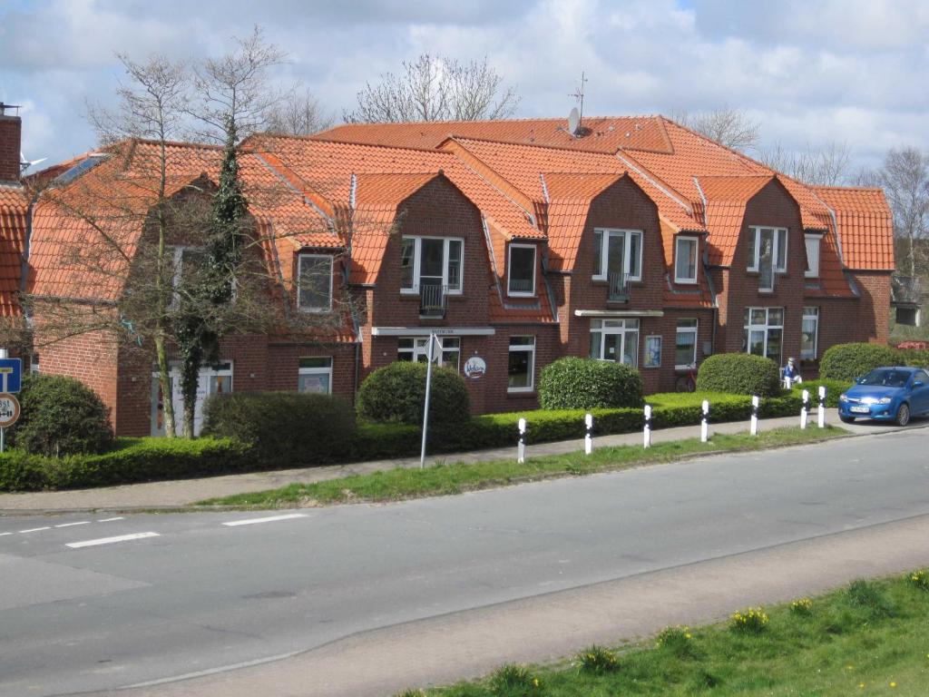 Ferienwohnung Hafenkoje Möhlenweg 2, 26553 Dornumersiel