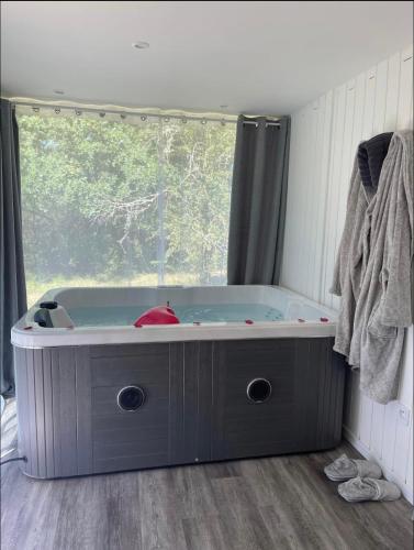 Charmant chalet cocooning avec Jacuzzi Arthon france