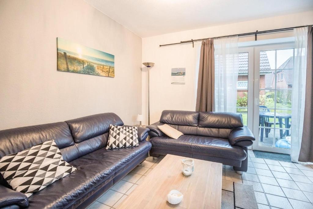 Maison de vacances Charmante Doppelhaushälfte Sperlingstr. 13a, 26553 Nessmersiel