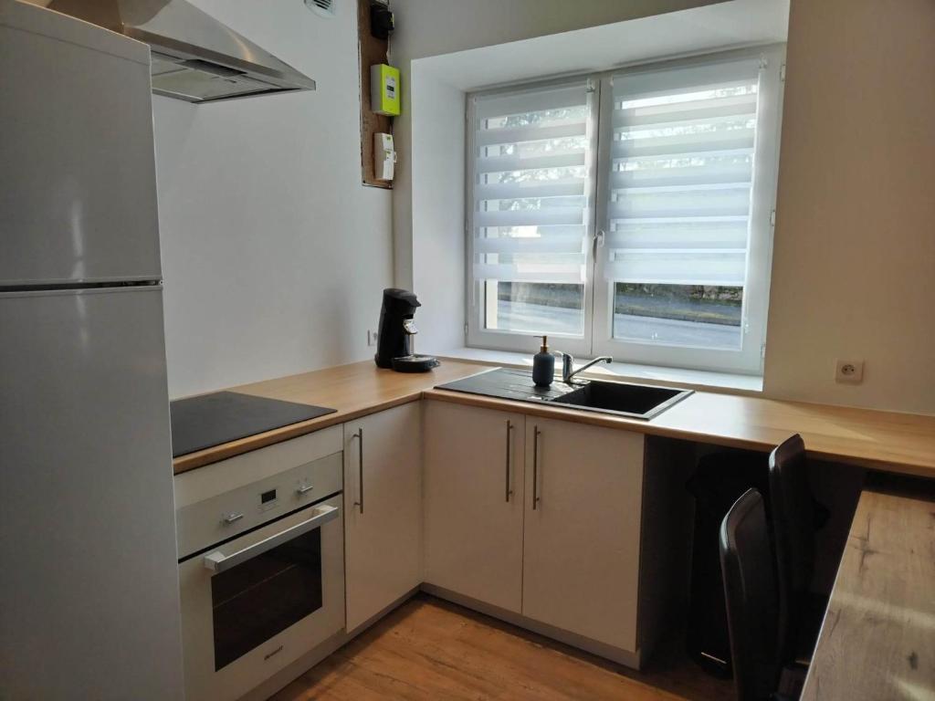 Maison de vacances Charmante petite maison proche du bourg 5 Rue de Fougères, 53410 Le Bourgneuf-la-Forêt