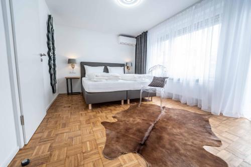 Appartement City Apartments FN L 6 KLIMATISIERT mit Balkon - Deluxe Doppelzimmer Möttelistraße 19 Friedrichshafen