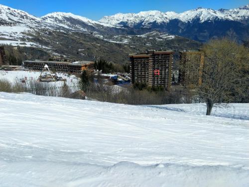 Appartement Corbier centre 32m2 balcon Sud vue pistes Vostok 9e étage Classé Tourisme et Label Qualité Hébergement déco Savoie Le Corbier Le Corbier