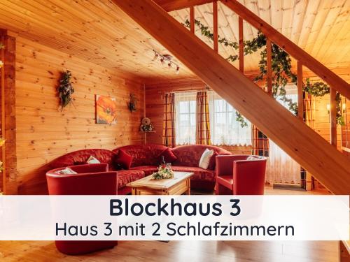 Maisons de vacances Der Fuchsbau - 3 Blockhäuser - ruhige Lage - 50m bis zum Wald - eingezäunter Garten Am Anger 19 Bad Sachsa