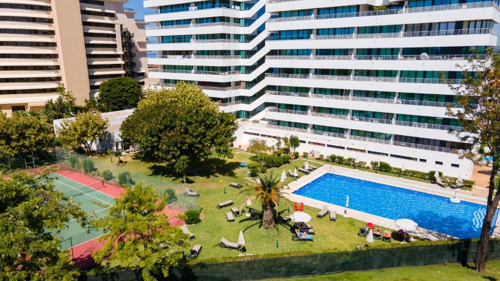 Appartement Divine Marina Apartment W/ Pool & Garden by LovelyStay Av. da Marina, Edifício Olympus Apartamento 805, 8125-406 Quarteira