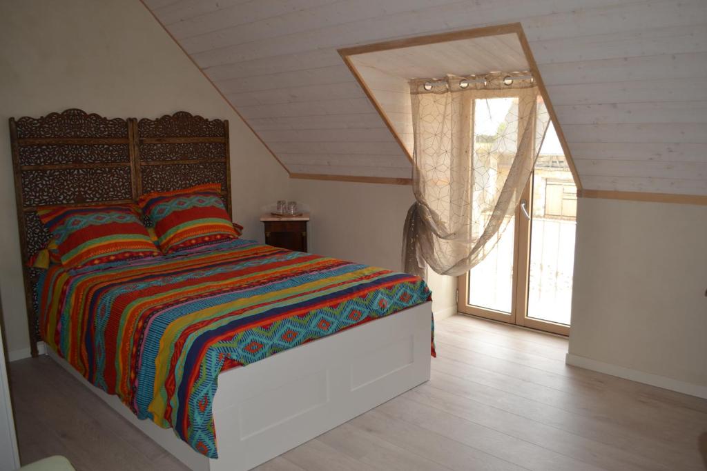 Séjour chez l'habitant Escale à Villeperdue chambre JÜRMALA La Barillonnerie, 37800 La Grande Maison