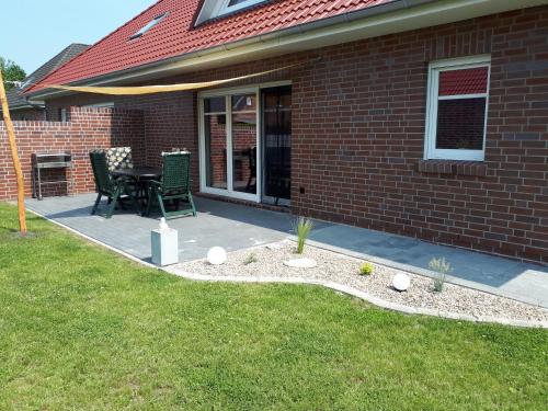 Maison de vacances Fehntjer Ferienhaus Torfweg 4a Großheide