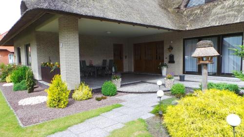 Appartement Ferien im Reetdachhaus Wacholderweg 8 Berumerfehn