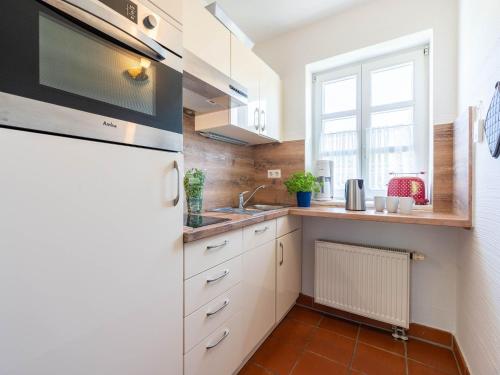 Appartement Feriendorf Rugana - Komfort Appartement mit 2 Schlafzimmern und Terrasse D34 Nonnevitz 25 a-b Dranske