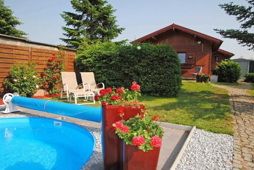 Maisons de vacances Ferienhaeuser mit Pool Kummerow SCHW 1010 Zum Eiskellerberg 8 Kummerow
