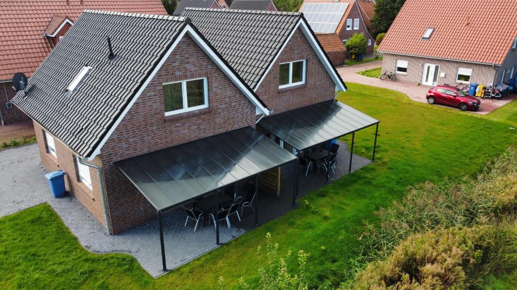 Maisons de vacances Ferienhaus am Seedeich 61 Geerdswehrstraße, 26723 Emden