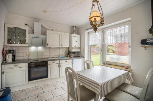 Maison de vacances Ferienhaus Behrends Alter Postweg 12 Marienhafe