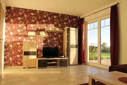 Maison de vacances Ferienhaus bei Familie Gau in Schaprode (Ortsteil Poggenhof) Ralph Gau Poggenhof 13 Schaprode