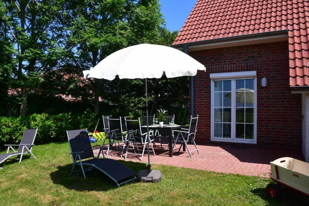 Appartement Ferienhaus Carolinenwind Mühlenblick 12/4, 26409 Carolinensiel