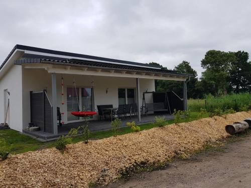 Maison de vacances Ferienhaus Deichblick Brachvogelweg 5 Schweiburg