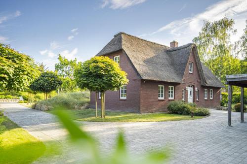 Maison de vacances Ferienhaus Gesoeders Hus Störweg 3 Sankt Peter-Ording