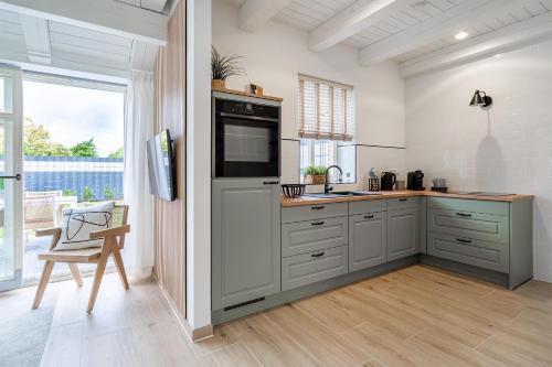 Maison de vacances Ferienhaus HafenKISTE Hobbingsweg 7 Greetsiel