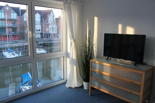 Maison de vacances Ferienhaus Hafenzeit Am Schleusenpriel 26 Cuxhaven