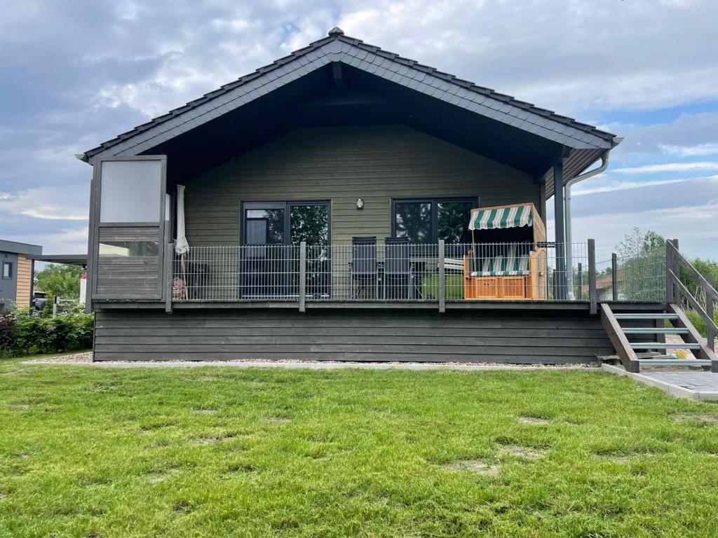 Maison de vacances Ferienhaus Haus Seehund direkt hinterm Deich an der Nordsee Brachvogelweg, 26349 Schweiburg