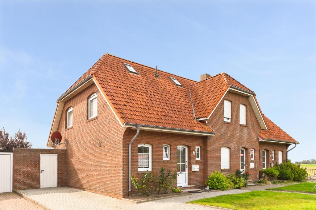 Maison de vacances Ferienhaus Hosnhuus 3 Meisenweg, 26553 Dornumergrode