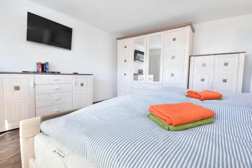 Maison de vacances Ferienhaus Insel-Paradies Ortsstraße 1 Kamminke