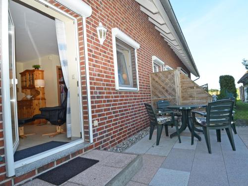 Appartement Ferienhaus Lobbe - Wohnung 04 mit Terrasse strandnah Dorfstr. 30 A - Apartment 04 Lobbe