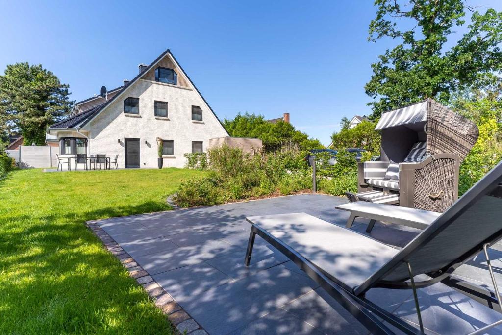 Maison de vacances Ferienhaus Nordstern Ferienhaus Nordstern Heideweg 43, 25826 Böhl