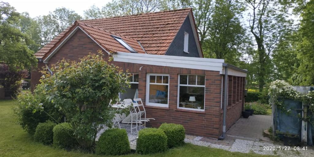 Maison de vacances Ferienhaus Nordwind 10 Ostdorfer Süderweg, 26553 Dornum