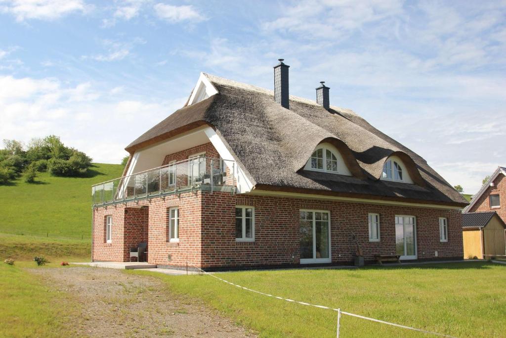 Maison de vacances Ferienhaus Rohrweihe Haus Terrasse, Gartennutzung, Meerblick Zum Höft 57a, 18586 Gager