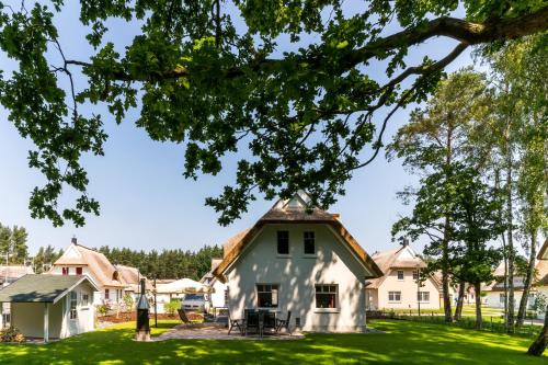 Maison de vacances Ferienhaus Rügensonne Glowe - Rügen 54 Am Dünenwald Glowe