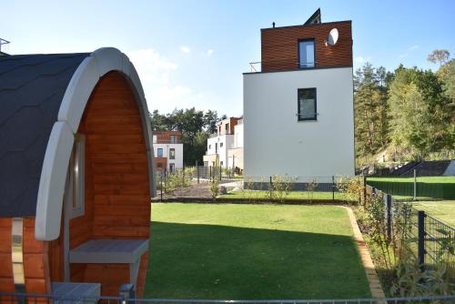 Maison de vacances Ferienhaus-See-Sauna-Kamin-Hund mit E-Ladestation Am Altdorfer See 2 b Krakow am See
