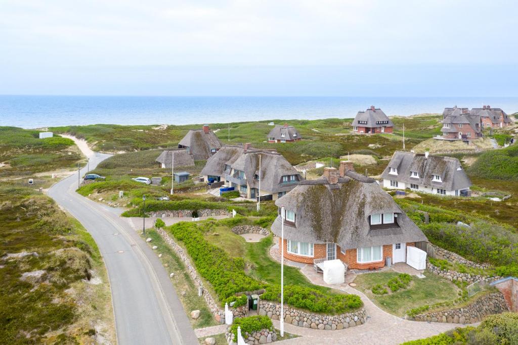 Maison de vacances Ferienhaus Seehaus Sylt - Urlaubszauber in den Dünen mit fantastischem Meerblick Henning-Rinken-Wai 6a, 6a, 25980 Rantum