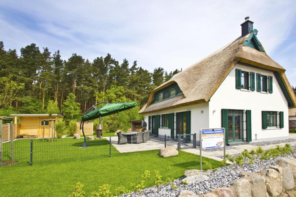 Maison de vacances Ferienhaus Seehund Haus Terrasse, Garten, eigene Sauna Am Dünenwald 66, 18551 Klein Gelm