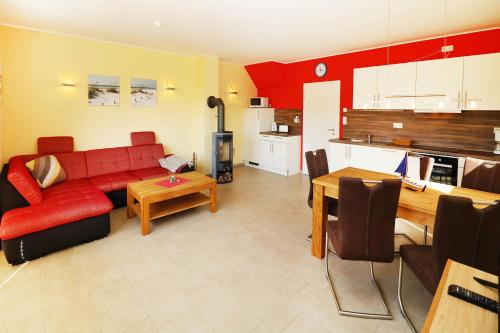 Maison de vacances Ferienhaus Sinha_SOMM Hinterm Deich 5 Karlshagen